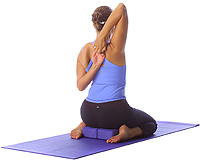 Yoga: Hero with tricep rotator cuff stretch